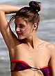 Olivia Palermo pulling down bikini top pics