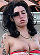 Amy Winehouse boobs slip in paparazzi shots pics