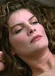 Rene Russo naked pics - sunbathes topless on a beach