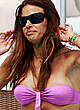 Kelly Bensimon in pink bikini on the beach pics