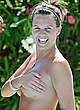 Danielle Lloyd sunbathing topless poolside pics