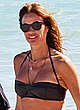Kelly Bensimon in black bikini on the beach pics