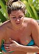 Claire Sweeney sunbathes in bikini on a beach pics