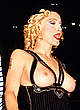Madonna shows boobs at fashion show pics
