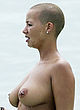 Amber Rose naked pics - revealing huge tanned boobs
