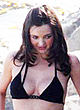 Miranda Kerr sunbathes in bikini on beach pics