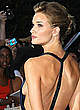Rosie Huntington-Whiteley shows side of boob at premiere pics