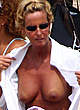 Federica Mancini caught topless on the beach pics
