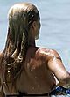 Michelle Hunziker flashes her bare breast pics