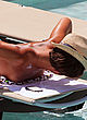 Frankie Sandford tanning topless on the beach pics