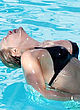 Hilary Duff shows hard teats in wet bikini pics