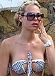Ilary Blasi busty wearing skimpy bikini pics