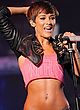 Frankie Sandford on stage in shorts & belly top pics