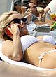 Jenny McCarthy sunbathes in tight bikini pics
