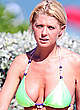 Tara Reid deep cleavage in green bikini pics