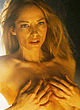 Sienna Guillory stripping topless in string pics