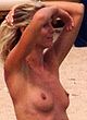 Heidi Klum naked pics - exposes her tanned boobs