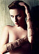 Scarlett Johansson naked pics - holds her bare breasts