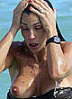 Claudia Galanti naked pics - boobs out on the beach