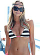 Stacy Keibler curves in skimpy bikinis pics