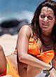 Ashley Tisdale cameltoe in a orange bikini pics
