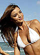 Miranda Kerr posing in wihite bikini photos pics