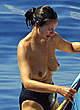 Carole Bouquet topless swimming & sunbathing pics