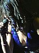 Selena Gomez shows boobs sides on stage pics