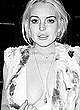 Lindsay Lohan cleavage and areola slip scans pics