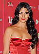 Camila Alves shows cleavage in red dress pics