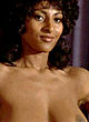 Pam Grier naked pics - slowly strips jumpsuit off