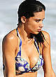 Adriana Lima cleavage in bikini on a beach pics
