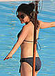 Lucy Hale in black bikini poolside shots pics