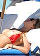 Lauren Stoner sunbathing topless on a beach pics
