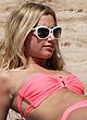 Ashley Tisdale sunbathing in pink bikini pics
