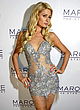 Paris Hilton cleavy in a short c-thru dress pics