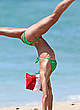 Sharni Vinson in green bikini beach aerobics pics