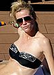 Brooklyn Decker sunbathing in black bikini pics