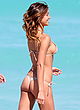 Belen Rodriguez looks hot in wet thong bikini pics