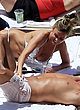 Katie Price grabs cock while tanning pics