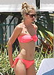 Doutzen Kroes wears red  bikini at the pool pics
