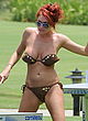 Amy Childs playing table tennis in bikini pics