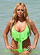 Aubrey O'Day looks hot in green bikini pics