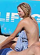 Samara Weaving naked pics - topless but covered at a beach