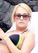 Carrie Underwood caught wearing bikini pics