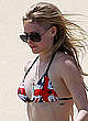 Avril Lavigne caught in bikini on the beach pics