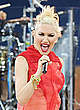 Gwen Stefani in red performs on the stage pics
