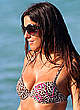 Claudia Romani cleavage in leopard bikini pics