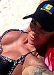 Jodie Marsh tanning in bikini on a beach pics