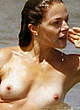 Claudia Gerini caught topless paparazzi shots pics